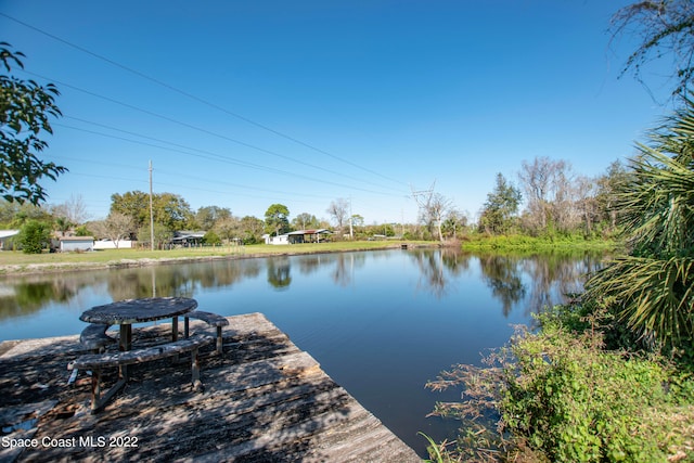 dock area featuring a water view