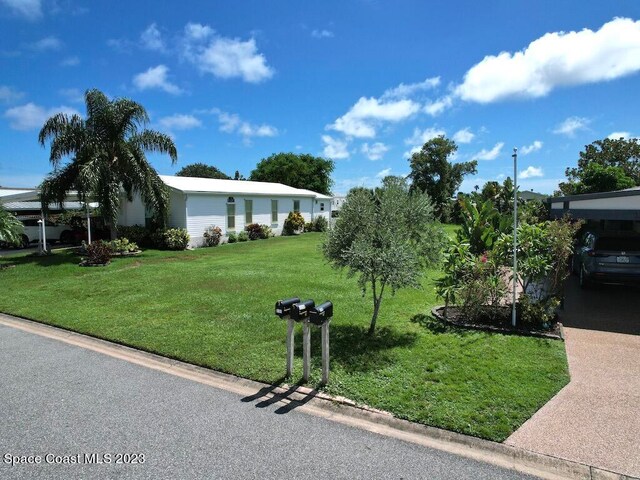 1112 Navajo Dr, Barefoot Bay, FL 32976