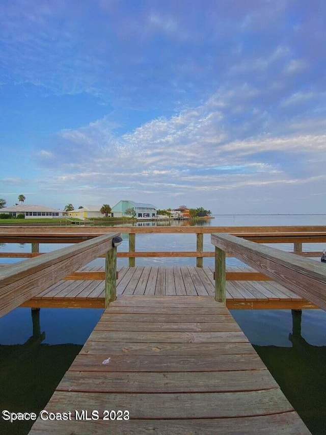 view of dock with a water view