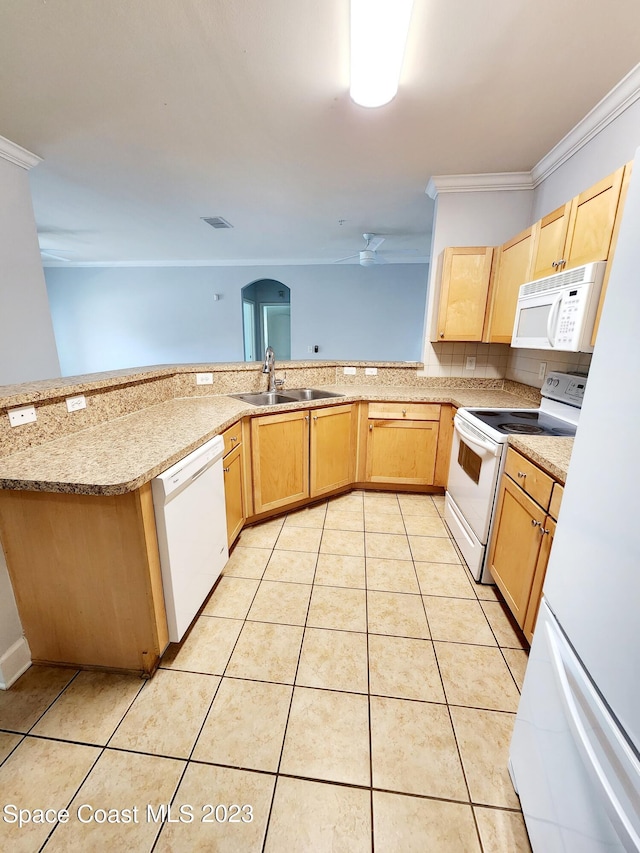 kitchen featuring kitchen peninsula, white appliances, light tile flooring, and sink