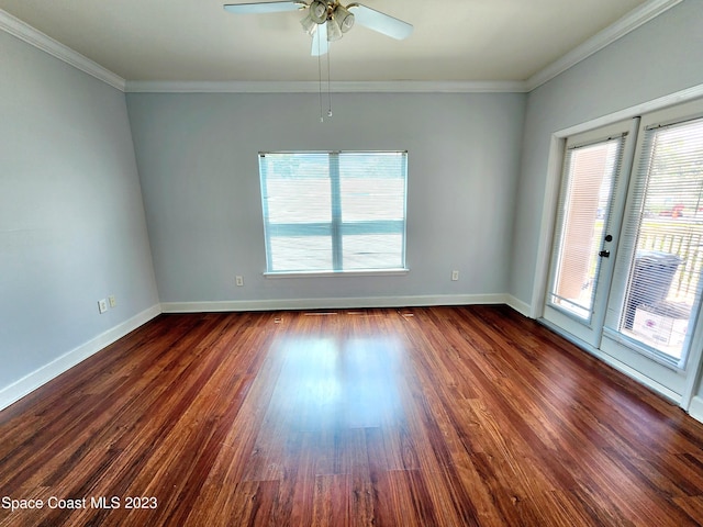 empty room with plenty of natural light and dark wood-type flooring