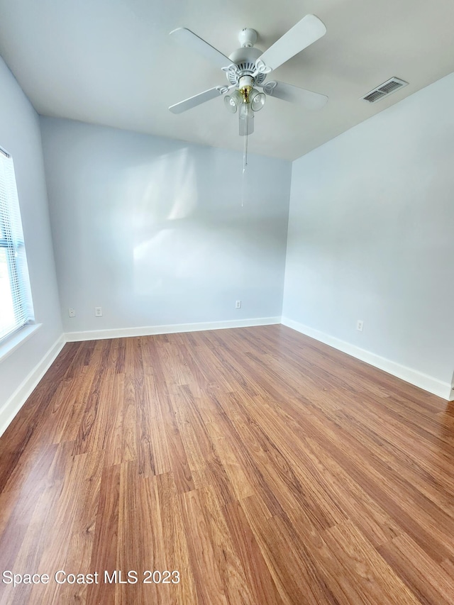 unfurnished room featuring light hardwood / wood-style floors and ceiling fan