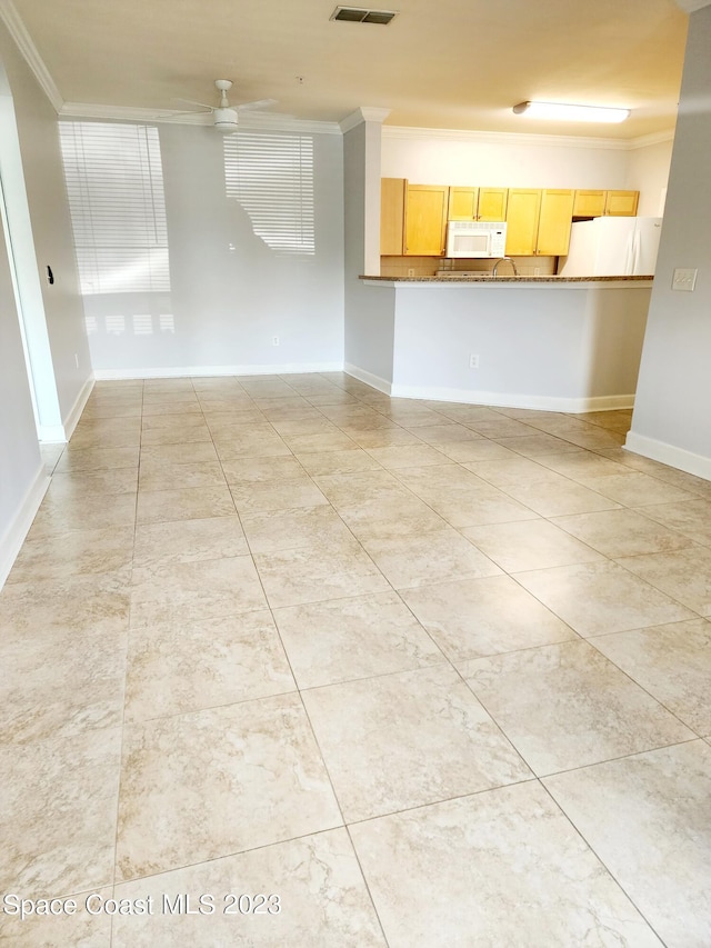 unfurnished living room with light tile floors, ornamental molding, and ceiling fan