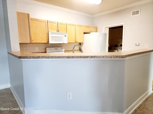 kitchen featuring tasteful backsplash, white appliances, ornamental molding, and light tile floors