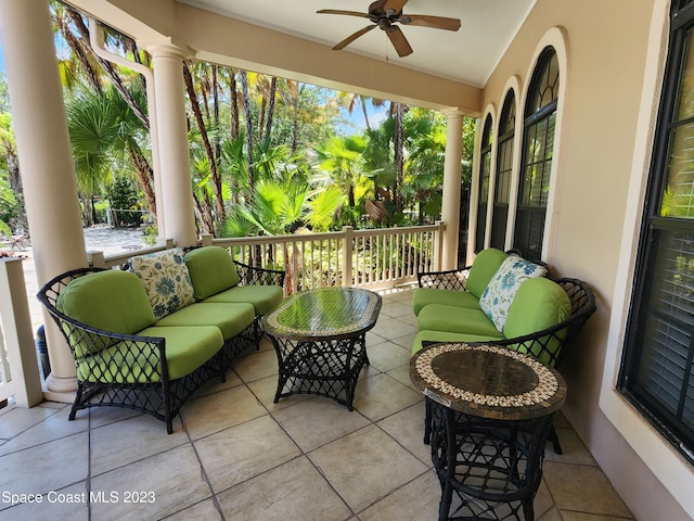 view of patio featuring an outdoor living space and ceiling fan