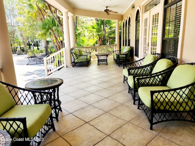 view of patio with outdoor lounge area and ceiling fan