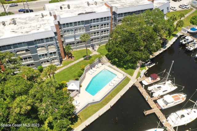 birds eye view of property featuring a water view