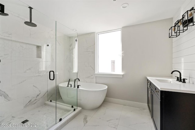 bathroom featuring tile flooring, separate shower and tub, and vanity