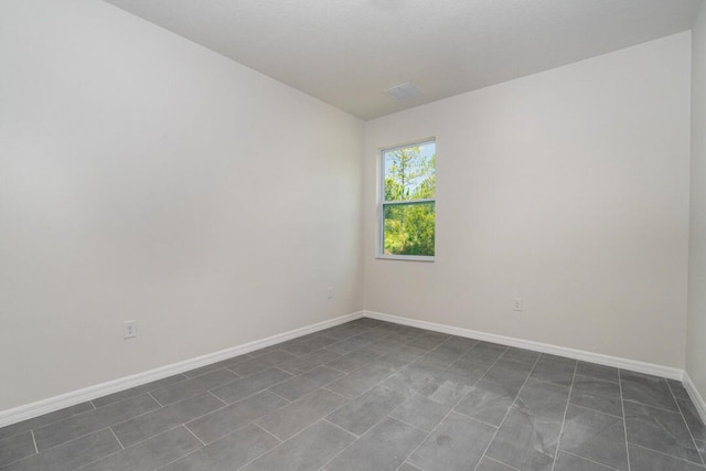 view of tiled empty room