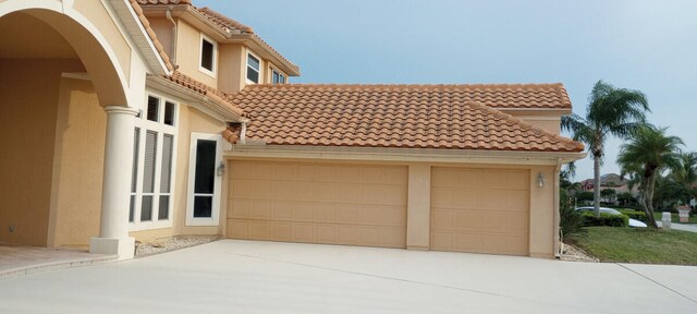 exterior space featuring a garage