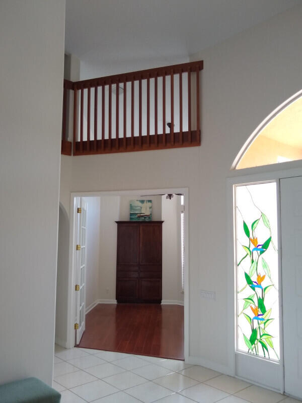 foyer featuring light tile patterned flooring