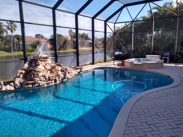 view of pool featuring a lanai