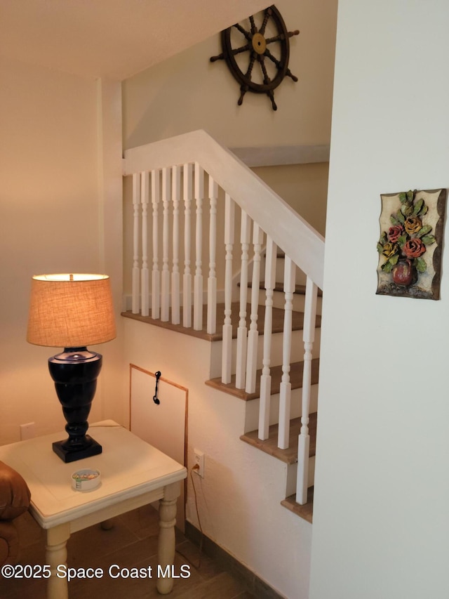 403 Hayes Ave, Cocoa Beach, FL 32931 - stairs featuring baseboards