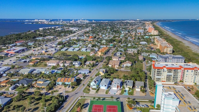 bird's eye view with a water view and a view of the beach