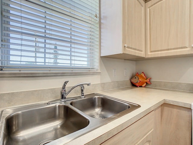 kitchen with a healthy amount of sunlight and light brown cabinetry