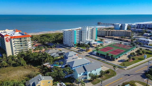 aerial view featuring a water view and a beach view