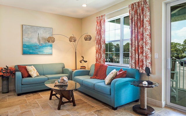 living room featuring light tile floors