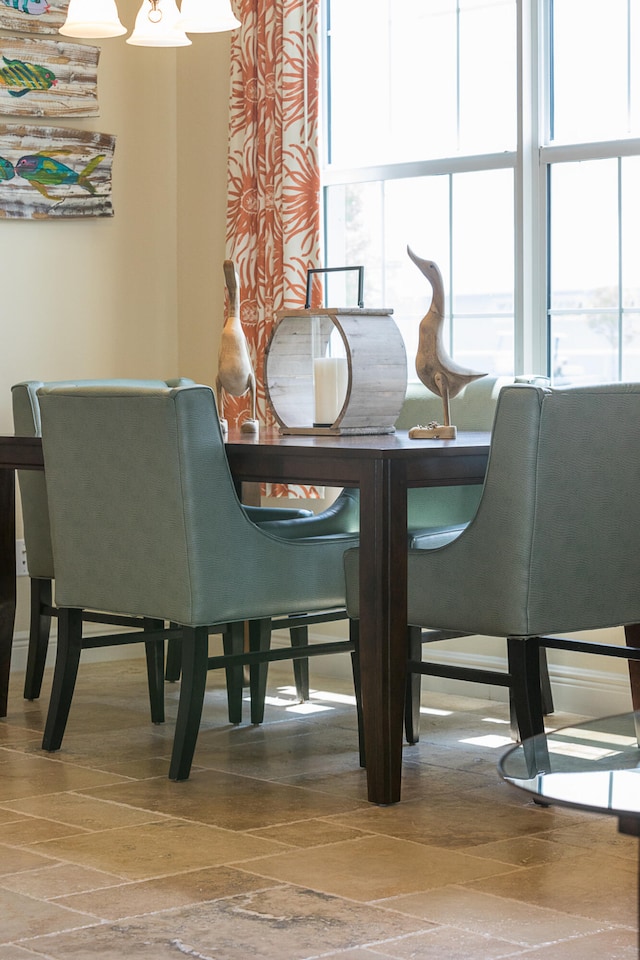 dining space with a healthy amount of sunlight