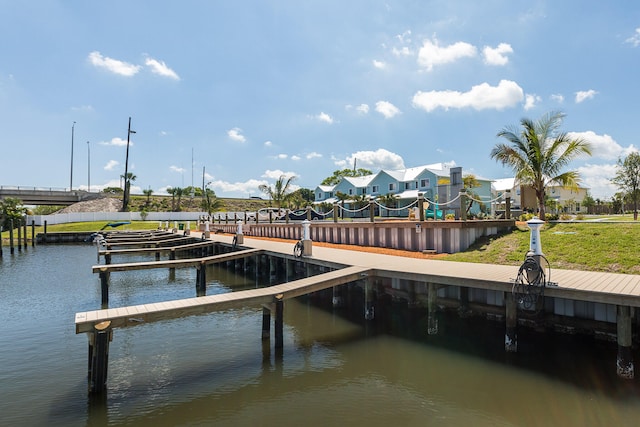 dock area featuring a water view