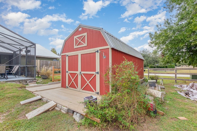 view of outdoor structure with a yard