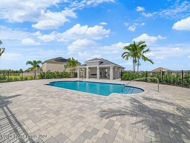 view of pool with a patio area