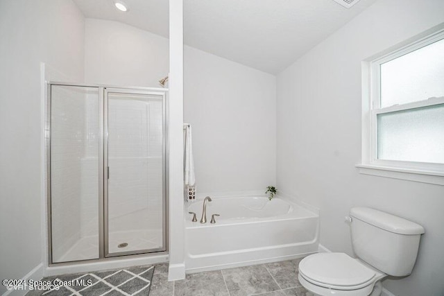 bathroom with toilet, vaulted ceiling, tile patterned floors, and separate shower and tub