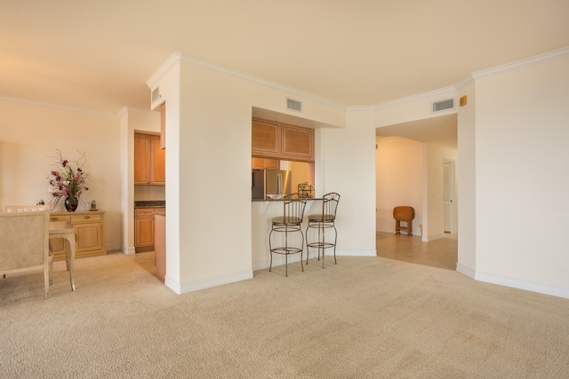 living room with light carpet and ornamental molding