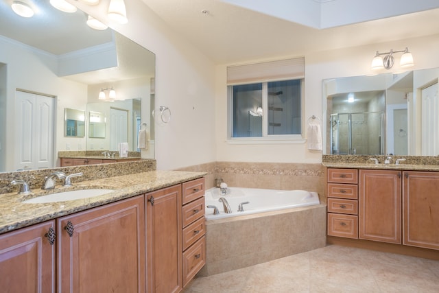 bathroom with independent shower and bath, dual bowl vanity, tile flooring, and crown molding