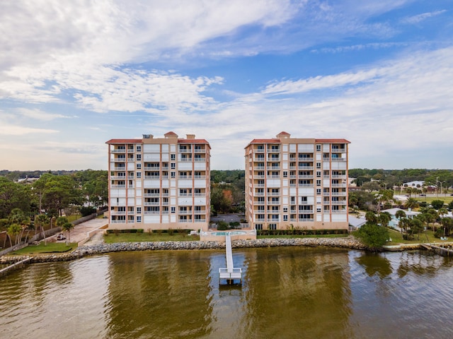 view of building exterior featuring a water view