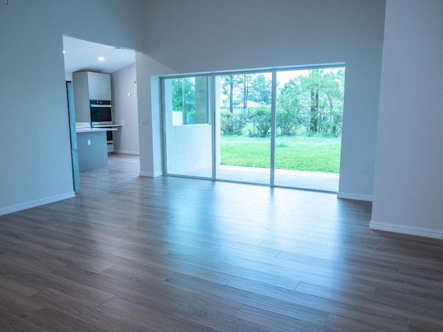 unfurnished room featuring wood-type flooring