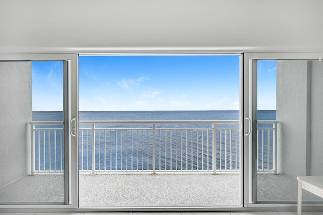 interior space featuring a water view