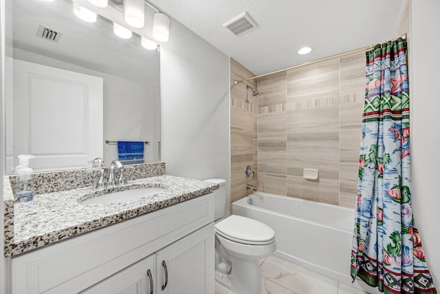 full bathroom with toilet, oversized vanity, a textured ceiling, tile flooring, and shower / tub combo with curtain