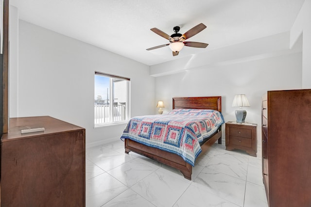 bedroom with ceiling fan and light tile floors