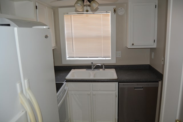 kitchen featuring white refrigerator, range, white cabinets, and stainless steel dishwasher