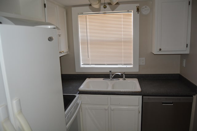 kitchen featuring stove, white cabinets, and dishwashing machine