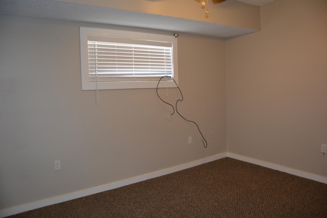 spare room featuring carpet floors