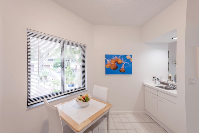 bathroom featuring vanity and tile floors