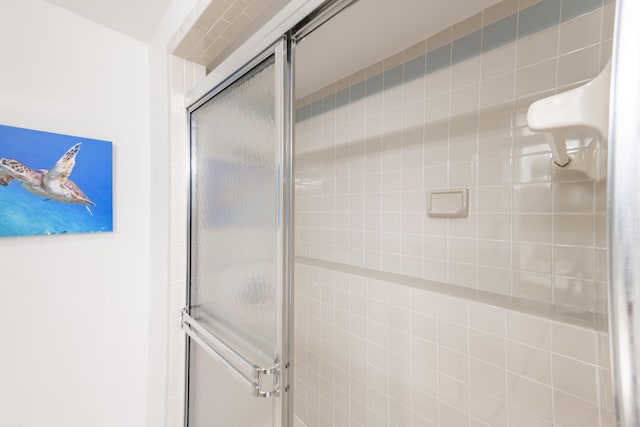 bathroom with an enclosed shower