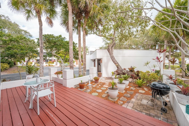 wooden deck featuring a patio