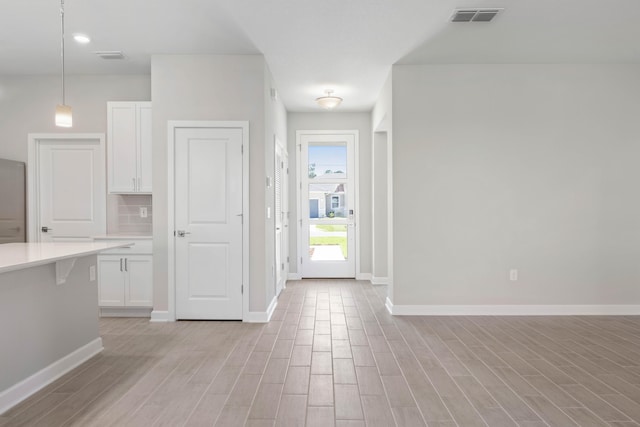 entryway with light wood-type flooring