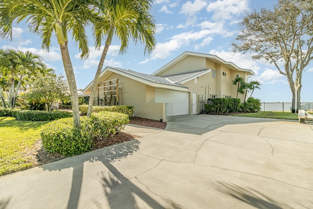 view of front of property with a garage