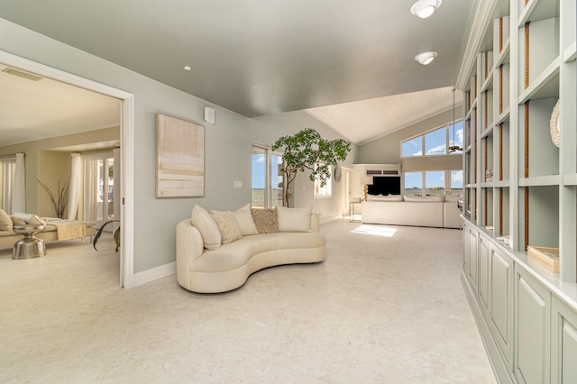 living room with vaulted ceiling