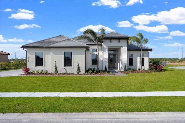 view of front of home with a front lawn