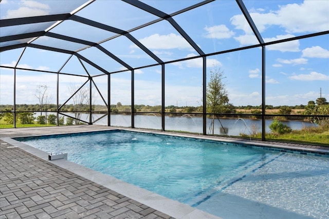 view of swimming pool with glass enclosure