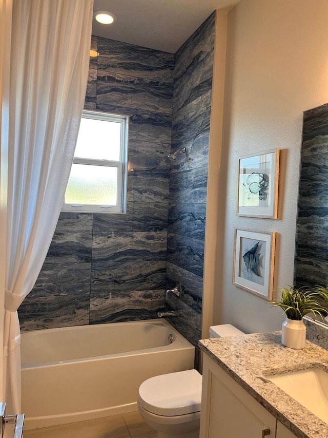 full bathroom featuring vanity, toilet, and shower / bathtub combination with curtain