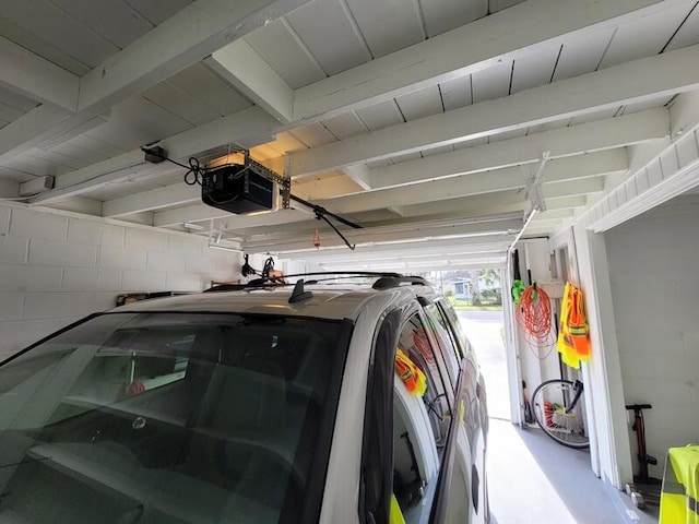 garage featuring a garage door opener