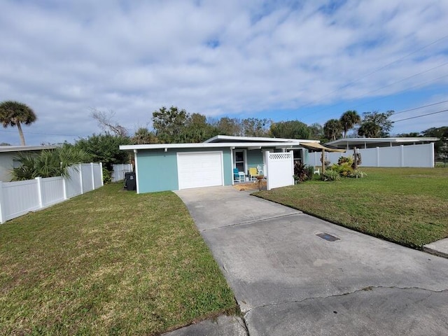 ranch-style home with a front lawn and a garage