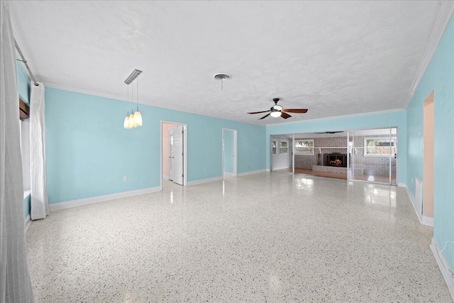 unfurnished living room with a textured ceiling, ceiling fan, and a tile fireplace