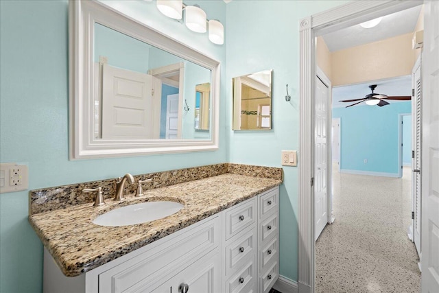 bathroom featuring vanity and ceiling fan