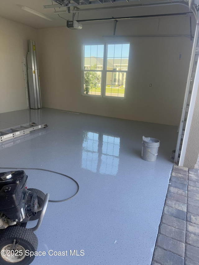 interior space featuring a garage door opener